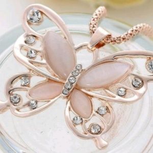Rose gold butterfly necklace with accents